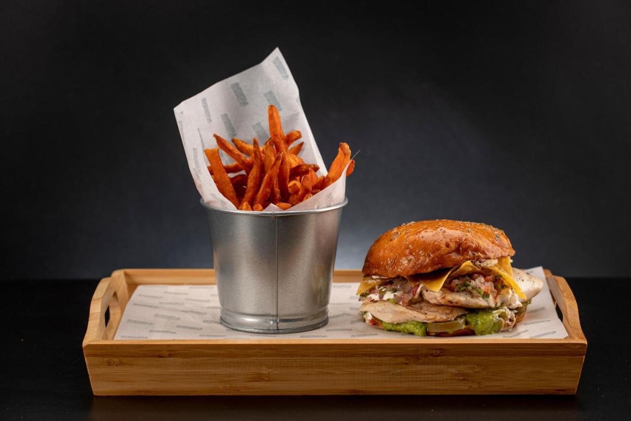 Le Meridien City Centre Bahrain Manama Exterior photo A burger and fries